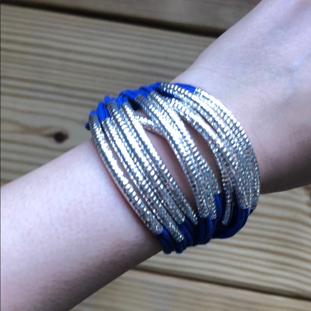 Blue Multi strap bracelet with silver detail